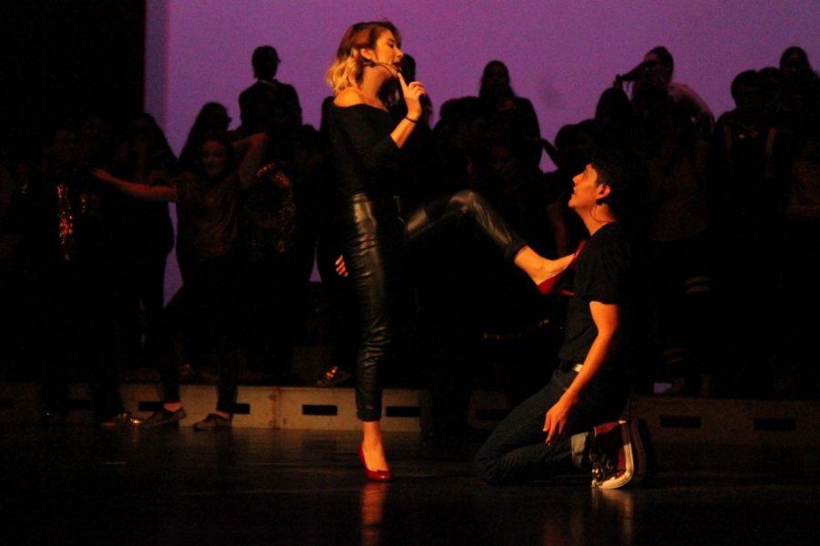 Seniors Casey Pena and Samuel Pequeno together in one of the duets of the show, Youre the One That I Want.
