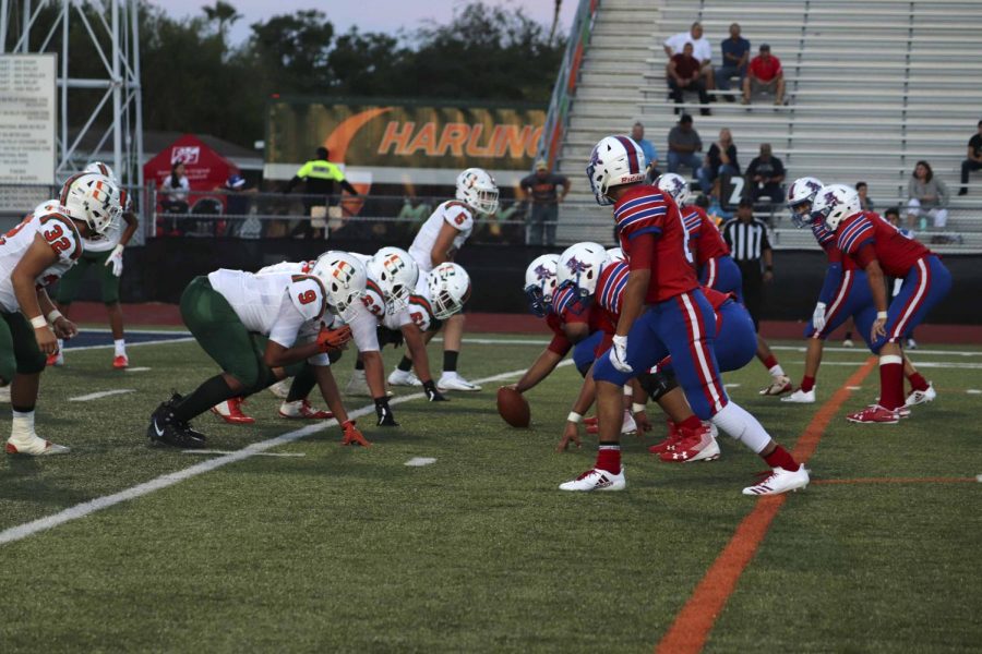 The Bobcat offense prepares for the play against the Harlingen South Hawks.