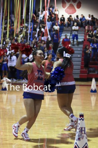 Alexandra Ramirez and Dana Luevano were sharing the enthusiastic energy and showing off their cheers at the Olympic pep-rally.